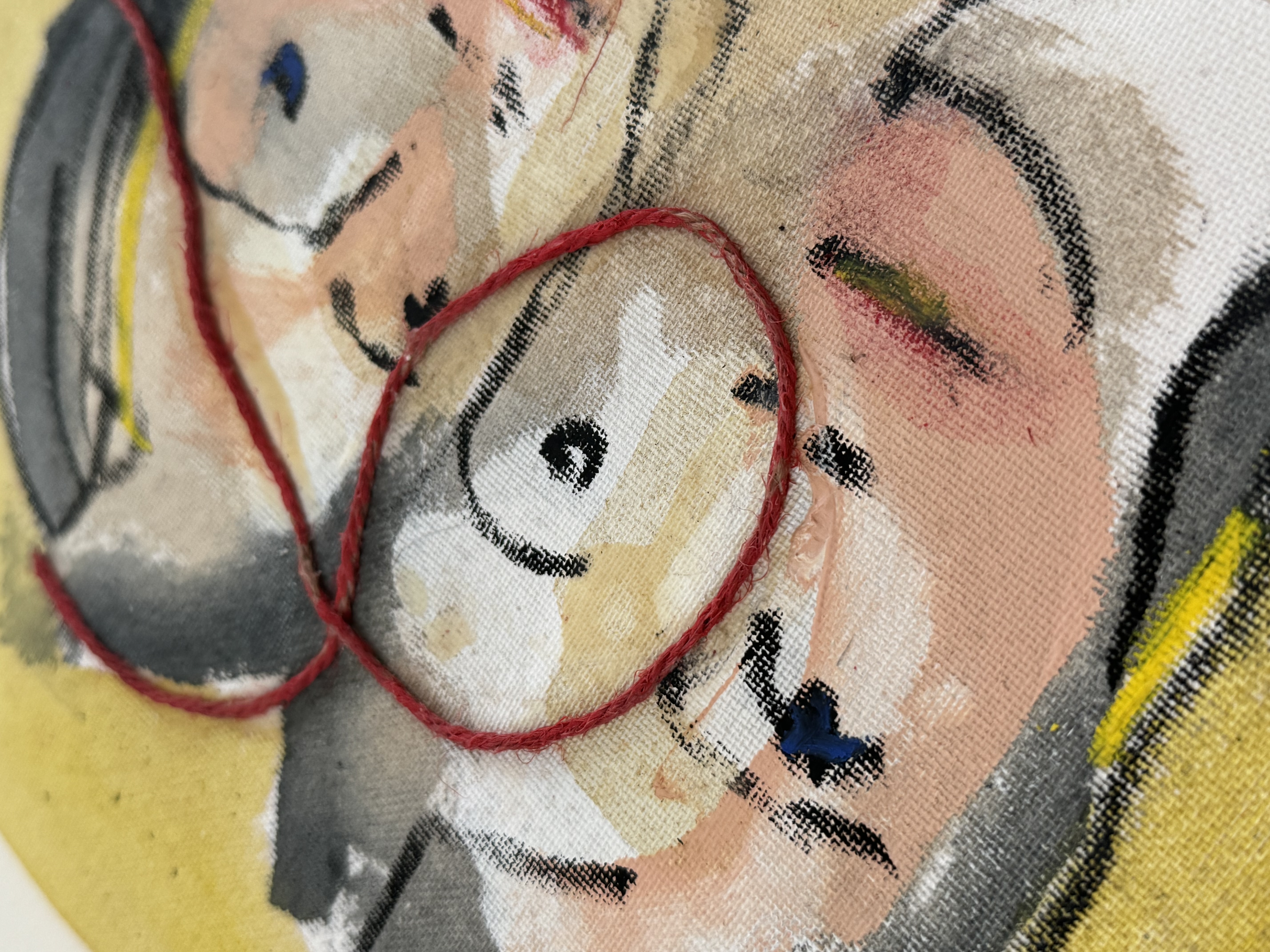 Werkdetail mit rotem Faden